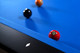 Close-up of custom mother-of-pearl billiard sight set into a high-gloss black rail on the Doc & Holliday Poshy Reverse Rainbow Slate Pool Table, highlighting precision craftsmanship and premium detailing. Close-up of custom mother-of-pearl billiard sight set into a high-gloss black rail on the Doc & Holliday Poshy Reverse Rainbow Slate Pool Table, highlighting precision craftsmanship and premium detailing.
